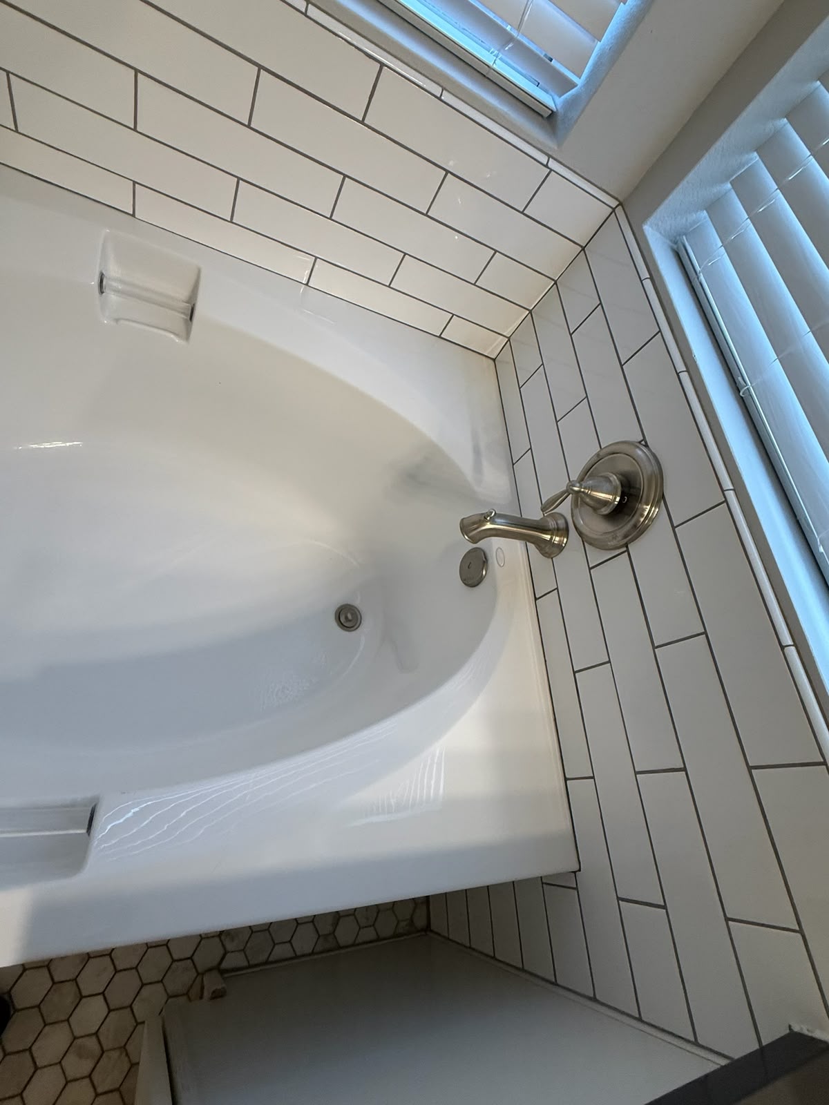 Soaking tub and surrounding tile spotless after cleaning
