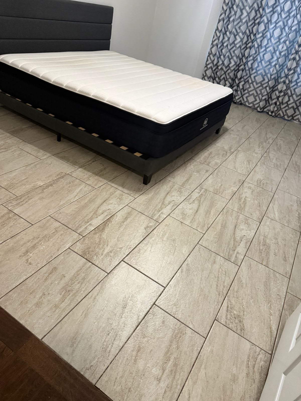 Same bedroom tile floor swept and mopped clean